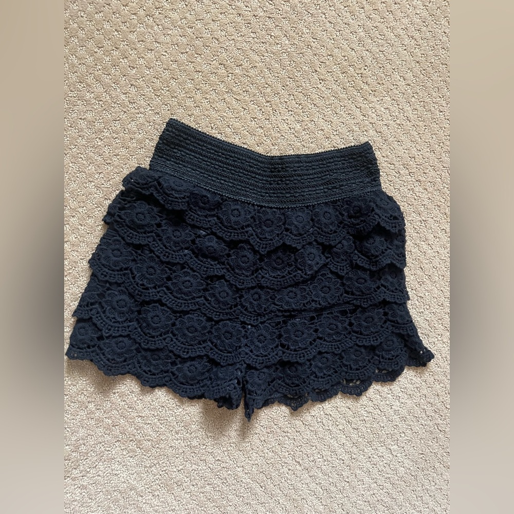 super cute and trendy black ruffle skort! never worn!!! size M